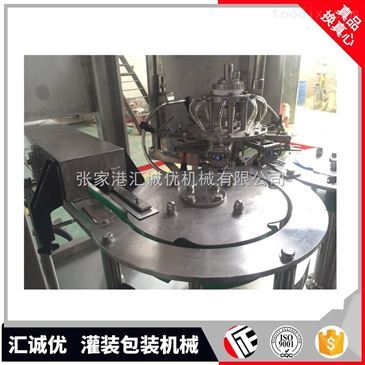 揭秘高效生產核心 沖洗、灌裝、封口三合一飲料包裝機